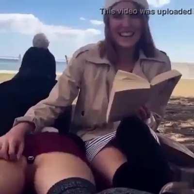 Enjoying a Good Book on The Beach