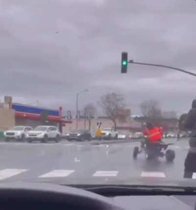 ATV rider shuts down an intersection in Oakland California