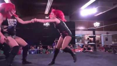 Saraya takes Kay Lee Ray's kick to the crotch