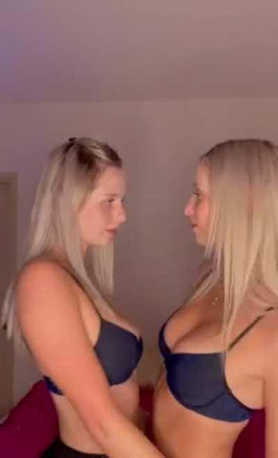 Blond twins getting ready to play