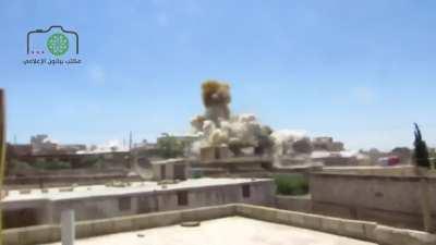 SyAAF dropped barrel bomb landing on a civilian home in FSA controlled Bayanun - 6/22/2014