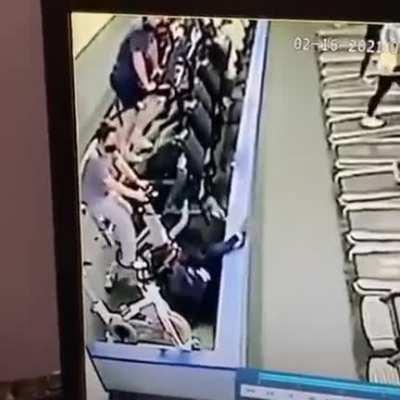 Staff watching the security camera footage of an earlier treadmill mishap