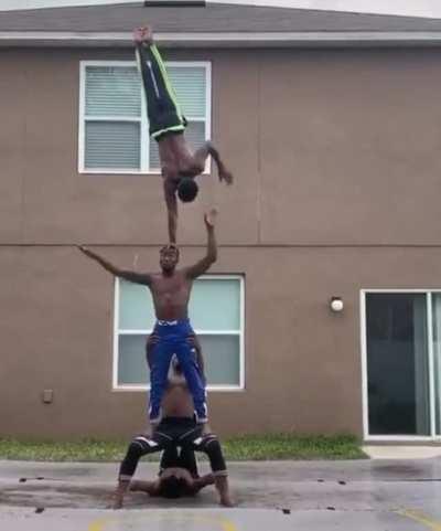 Absolutely insane acro-yoga