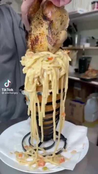 This &quot;sandwich&quot; with an entire roasted bird and covered in cheese sauce