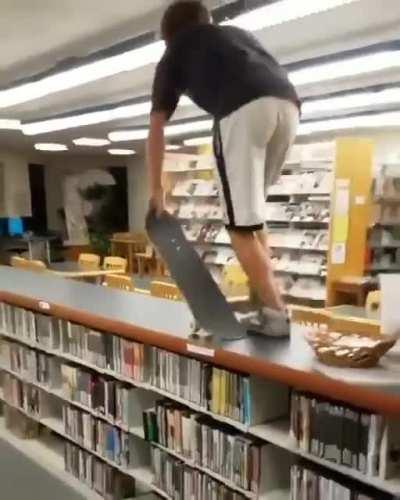 Gliding on roller skates in the library...