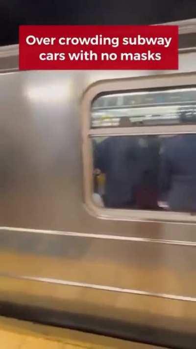 Officers in crowded subway refuse to follow New York's mask mandate, officers ticket or arrest thousands for doing the same.