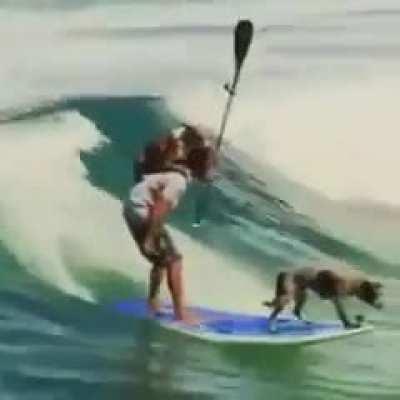 The way he managed his dog while surfing is incredible.