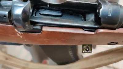 Pakistan Lee-Enfield conversion to 5.45, taking AK-74 mags.