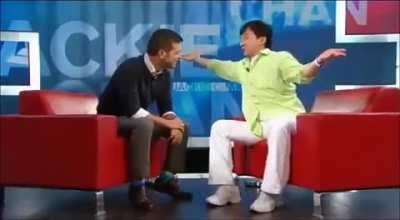 Jackie Chan in an interview talking about how his son changed after moving to the USA