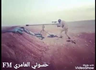 Iraqi Shiite militants utilize an Iranian-made anti-material rifle with a very long barrel (date: Unknown, location Iraq).