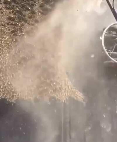 Magnetic robot power washer used to clean the side of a ship