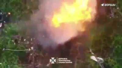 Russian on fire by drone drop grenade, April 2024