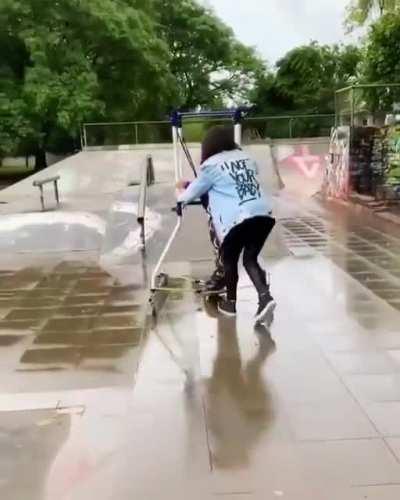 Mom helps her son with cerebral palsy skateboard for first time on special modified board