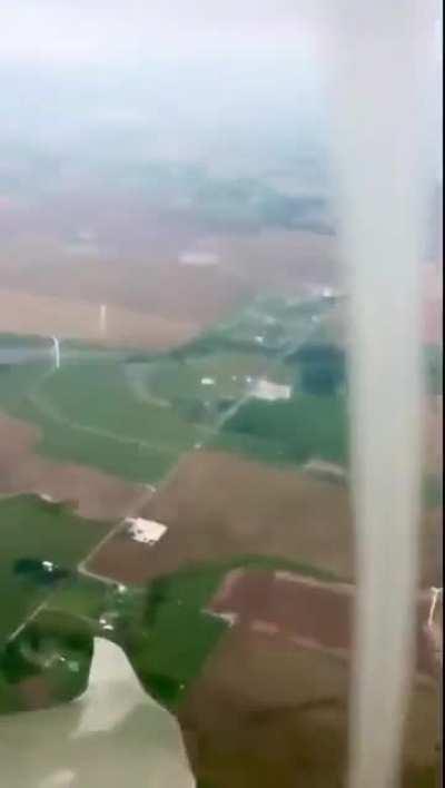 Flying next to a tornado forming
