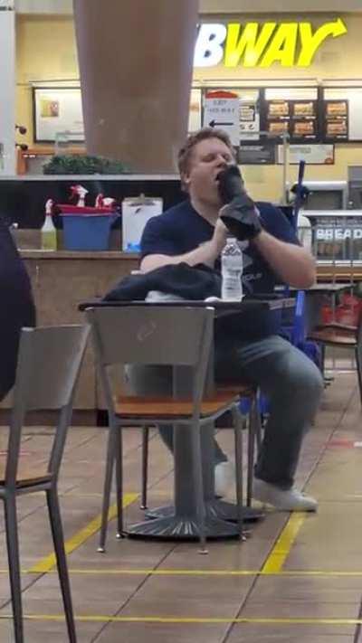 Guy licking a boot in public at the Cambridge Ontario mall