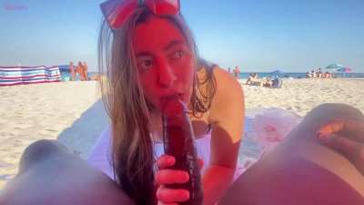 White babe sucks huge BBC at the beach