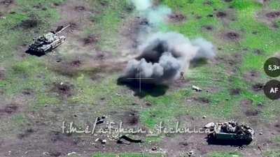 2 Russian soldiers on a motorcycle approach Robotyne and are targeted by drones and artillery, all while falling off the bike several times, one manages to enter a dugout in the end