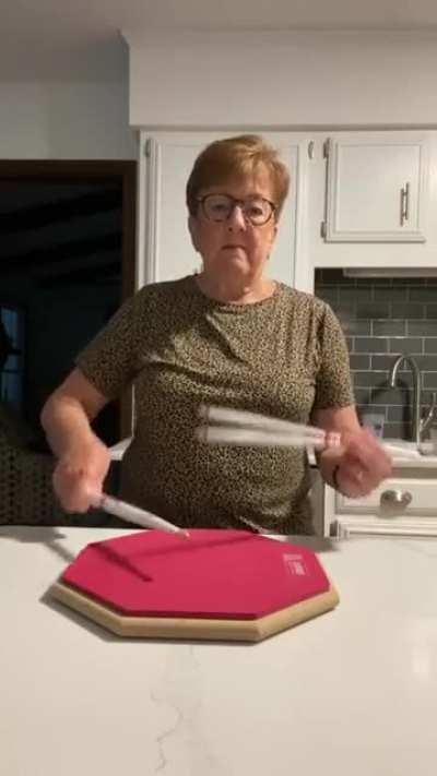 Grandma Showcases Smooth Drum Doubles