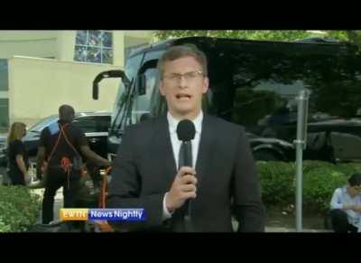 Reporter doing a live cross