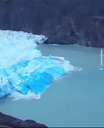 Dark blue ice exposed due to glacier flipping