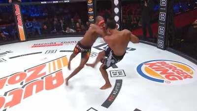 'What a sequence, what a sport!' Douglas Lima kicks Michael Page clean off his feet then crumples him with a monster uppercut as he tries to stand up (with slo-mo replay)