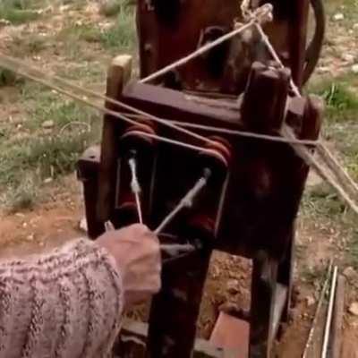 Making rope out of hemp fibers.