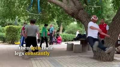 Elderly people in China doing &quot;neck workouts&quot;