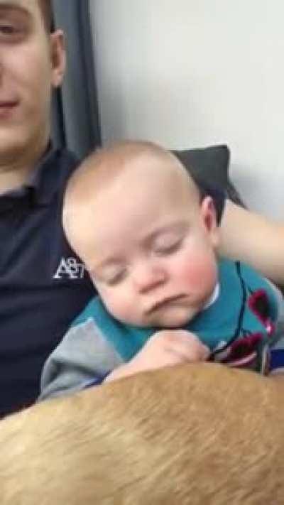 Dad Puts Baby to Sleep by Sliding Hand on Face