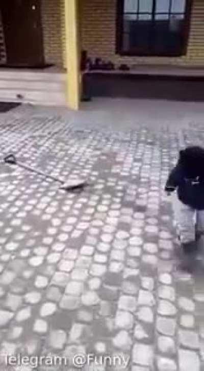 WCGW playing with a shovel