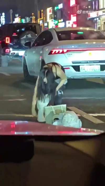 Women treat the street as their dressing room.