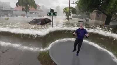 The graphics guy creates live simulation to help the weather reporter explain storm surge