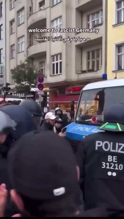 Staged/Forced police brutality from a Palestine protestor in Germany. 