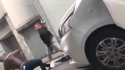 Man gets knocked out after blocking a car