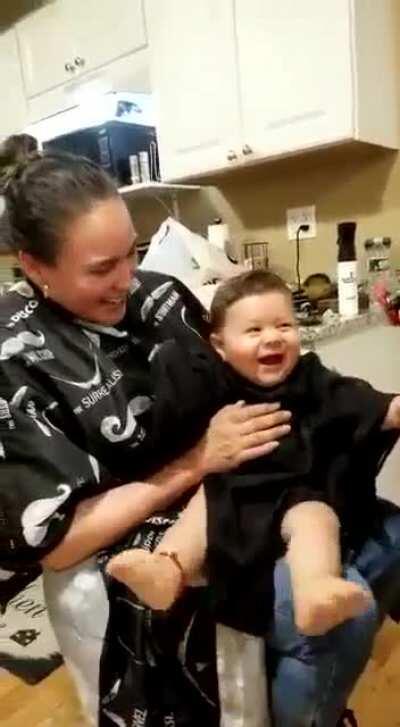 Baby enjoying the barber shop