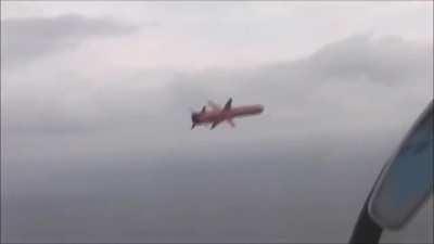 Ukrainian Su-27 chasing a Neptune anti-ship missile during a test. Archival footage.