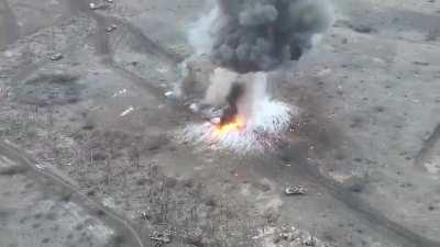 Avdiivka, a Ukrainian FPV munition flies into the rear of a Russian BMP, causing a catastrophic detonation.