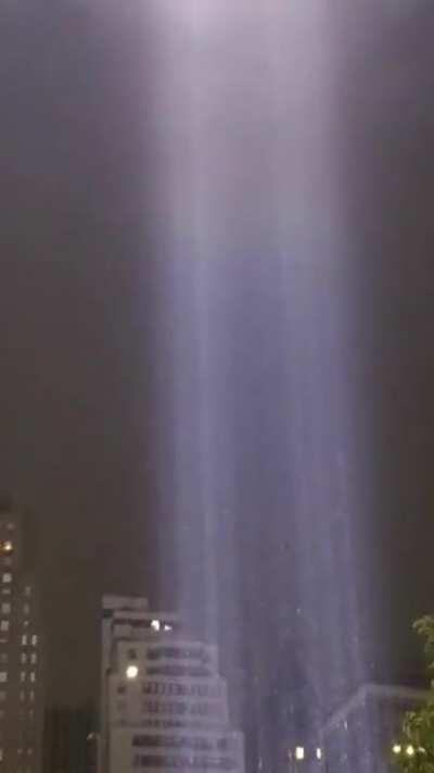 9/11 Tribute in Light shimmering in the rain tonight. Worth getting soaked to see this IRL.