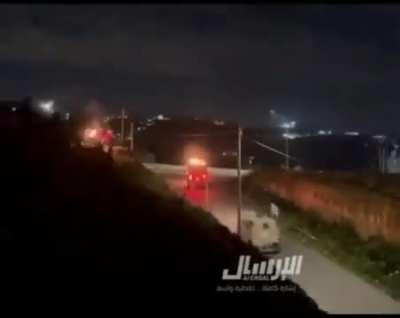 Palestinian Militants in Ramallah Hurling Stones and Molotoves at IDF Armored Vehicles.