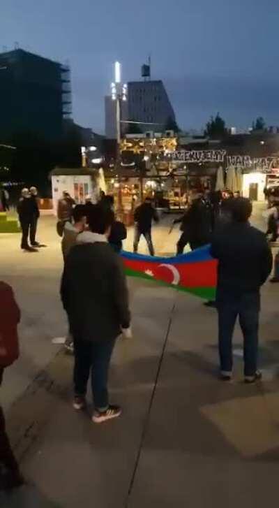 Armenian masked radicals with guns attacked the peaceful Azerbaijanis protesters in Katowice, Poland.