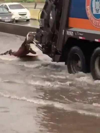 Trash truck flood surf