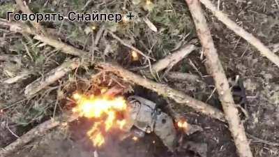 Russian is hit by an incendiary munition dropped from drone