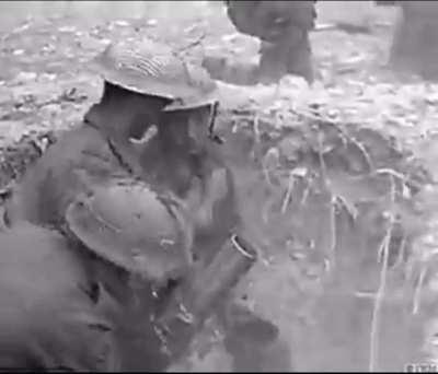 British 3â mortar team rapid fire salvo in Normandy