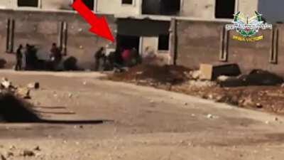 An SAA Soldier defends his building against a group of enemy fighters swarming his position