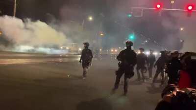 Protest from east Portland, Or- on 9/7- after once again attacking the crowd police chase down people while heckling them. This police officer tells a protestor they're “hiding behind the press like a coward”