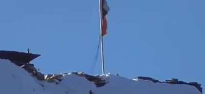 Kashmiri freedom fighter takes out an indian soldier hoisting an indian flag in kashmir