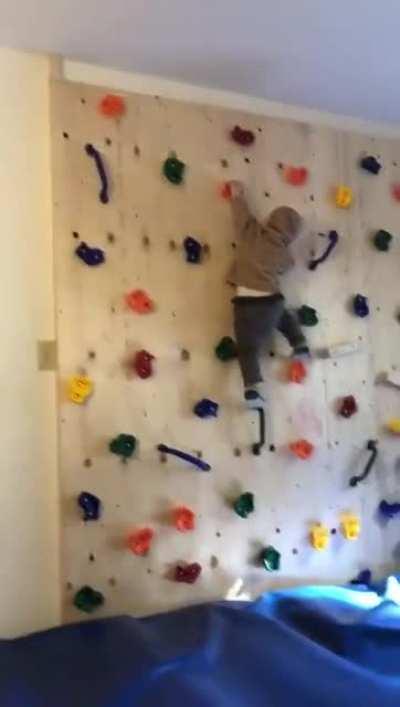 Father built his kid a climbing wall to get him to stop climbing furniture and it only made the tot more powerful