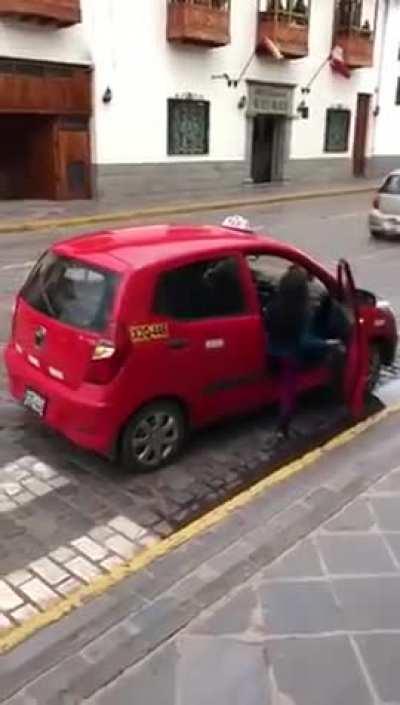 In Cuzco, Peru it’s apparently perfectly normal to take a taxi with your Llama