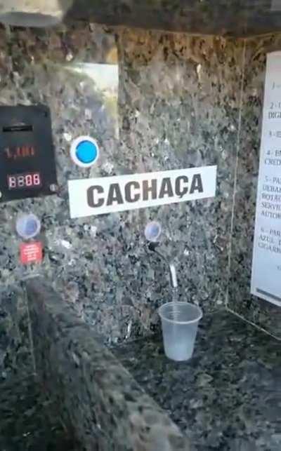 The owner of this bar created a dispenser to sell &quot;cachaça&quot; (distilled drink very common in Brazil) and cigarettes automatically even when the bar is closed.