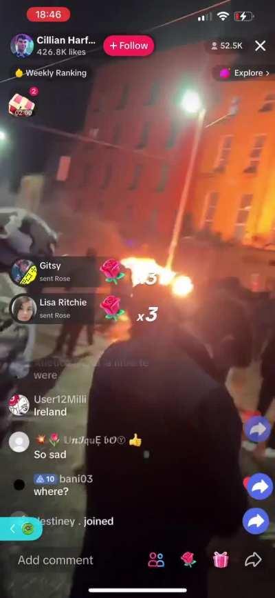 Riots in Dublin City centre as anti-migrant protesters rampage through an active crime scene setting cars and buses on fire and assaulting Gardai