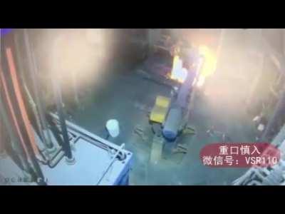 Chinese worker pushed into Furnace by a Robotic arm